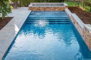 Residential swimming pool built by Eastern Aquatics
