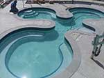 Clover shape hot tub with bluestone coping