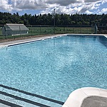 Gunite Swimming Pool with White Precast Caoping